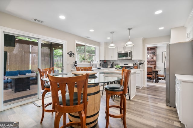 565 Barsham Way, Johns Creek, GA 30097 - dining room with light wood-style floors and recessed lighting