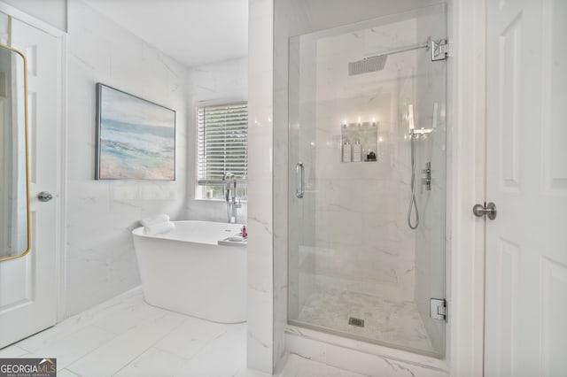 565 Barsham Way, Johns Creek, GA 30097 - full bathroom with marble finish flooring, a freestanding bath, and a marble finish shower