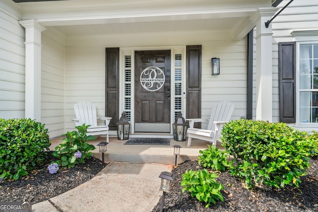 565 Barsham Way, Johns Creek, GA 30097 - property entrance with a porch