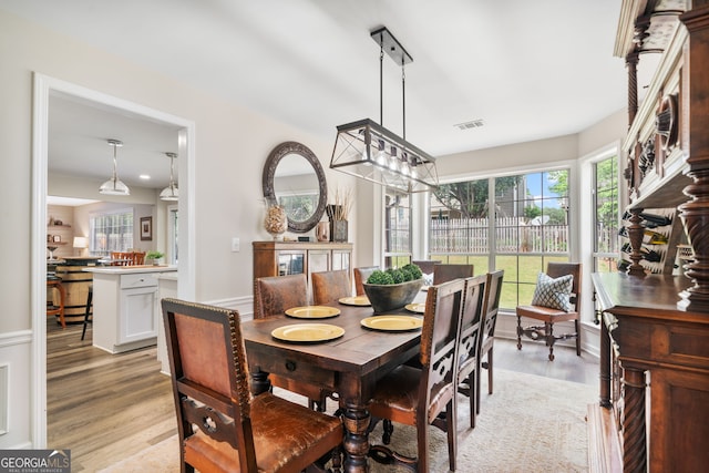 565 Barsham Way, Johns Creek, GA 30097 - dining space featuring light wood-type flooring