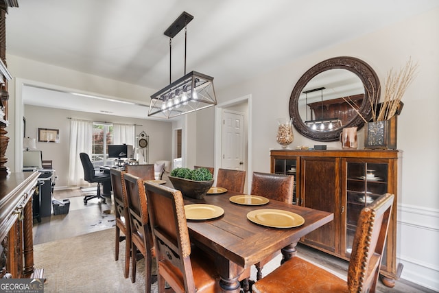 565 Barsham Way, Johns Creek, GA 30097 - dining area featuring an office area, wood finished floors, and a chandelier