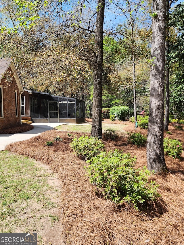 213 Falcon Crst, Warner Robins, GA 31088 - view of yard with a sunroom