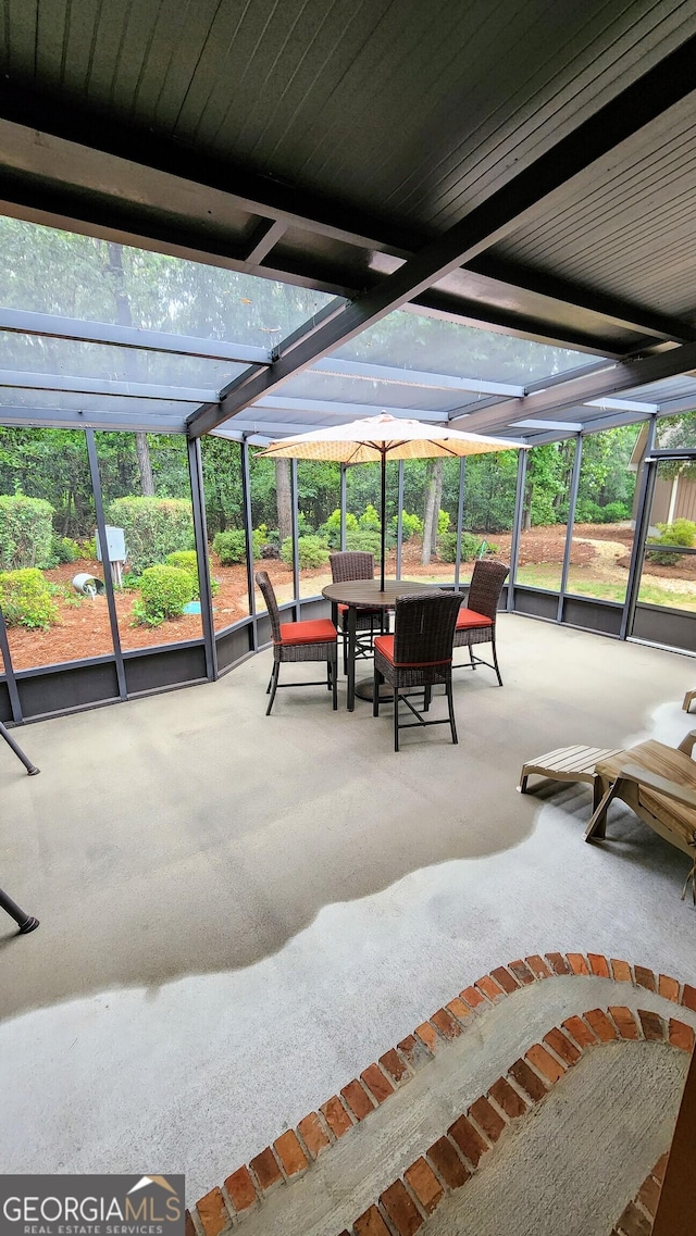 213 Falcon Crst, Warner Robins, GA 31088 - sunroom / solarium with outdoor dining area and healthy amount of natural light