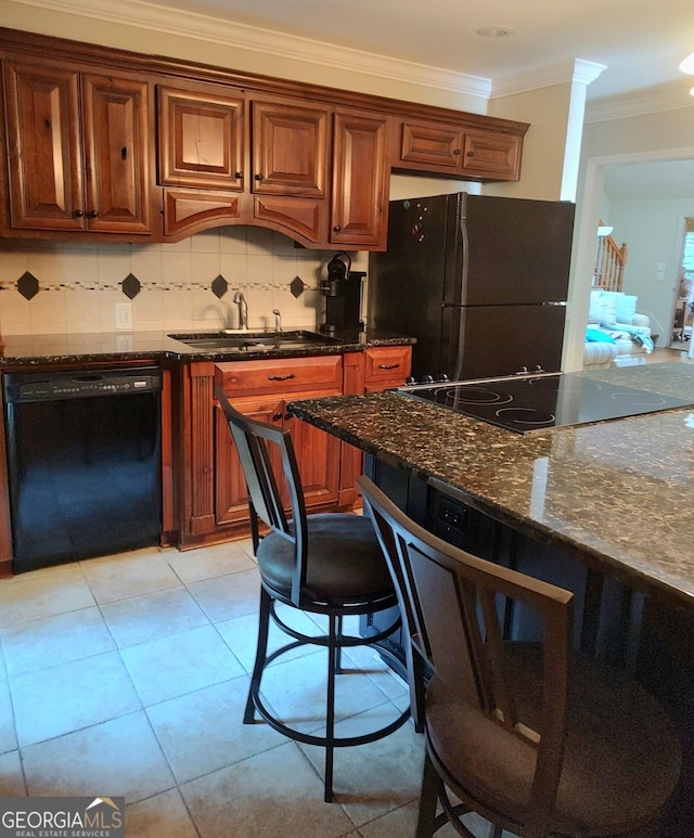 213 Falcon Crst, Warner Robins, GA 31088 - kitchen with black appliances, a sink, crown molding, dark stone counters, and tasteful backsplash