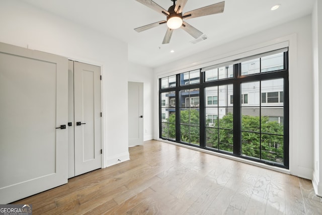 71 Krog St NE, Atlanta, GA 30307 - unfurnished bedroom with recessed lighting, baseboards, wood finished floors, and a ceiling fan