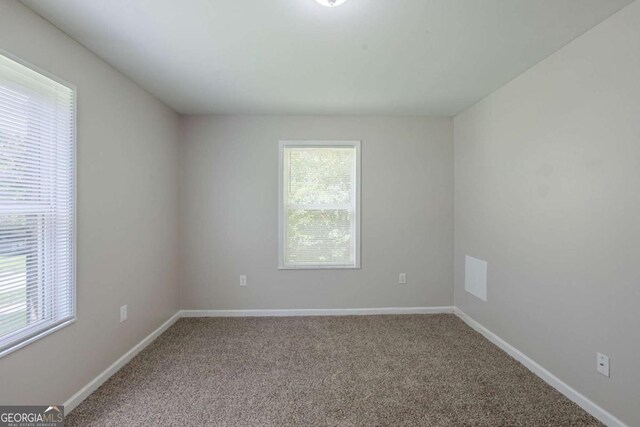 1808 Arkose Dr SE, Atlanta, GA 30316 - empty room featuring carpet and baseboards