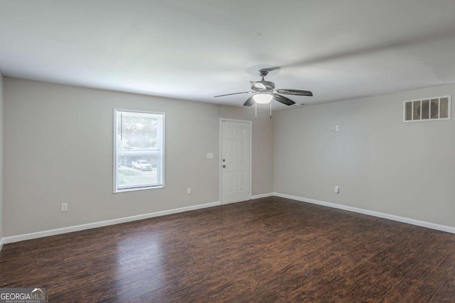 1808 Arkose Dr SE, Atlanta, GA 30316 - spare room featuring dark wood-style floors, a ceiling fan, and baseboards