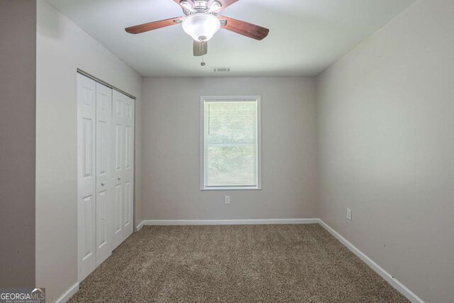 1808 Arkose Dr SE, Atlanta, GA 30316 - unfurnished bedroom with carpet, baseboards, and a closet