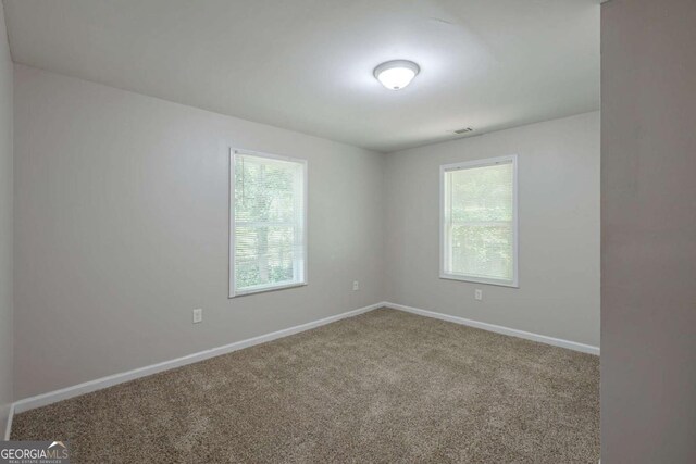 1808 Arkose Dr SE, Atlanta, GA 30316 - carpeted empty room featuring baseboards