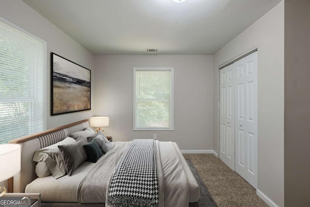 1808 Arkose Dr SE, Atlanta, GA 30316 - carpeted bedroom featuring a closet and baseboards