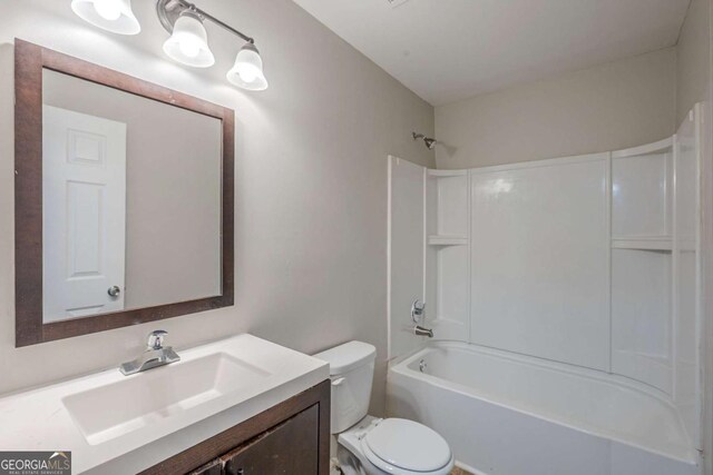 1808 Arkose Dr SE, Atlanta, GA 30316 - bathroom featuring toilet, vanity, and  shower combination