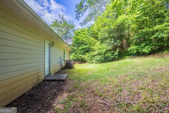 1808 Arkose Dr SE, Atlanta, GA 30316 - view of grassy yard featuring central air condition unit