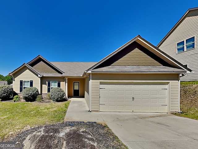 9 Holsteiner, Dallas, GA 30132 - view of front of property featuring driveway, an attached garage, and a front lawn
