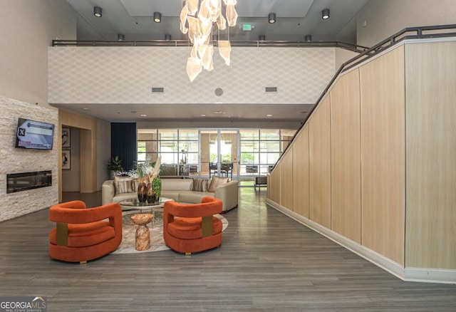 common area with a towering ceiling
