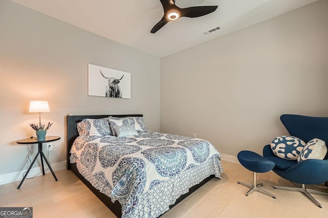 775 Juniper St NE Unit 612, Atlanta, GA 30308 - bedroom with a ceiling fan, baseboards, and wood finished floors