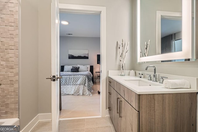 775 Juniper St NE Unit 612, Atlanta, GA 30308 - ensuite bathroom with vanity and tile patterned flooring
