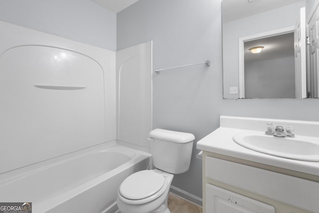 full bathroom with vanity, toilet, baseboards, and tile patterned floors