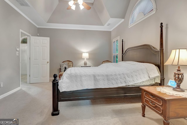 carpeted bedroom with multiple windows, ornamental molding, ceiling fan, baseboards, and high vaulted ceiling