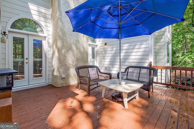 wooden terrace featuring french doors