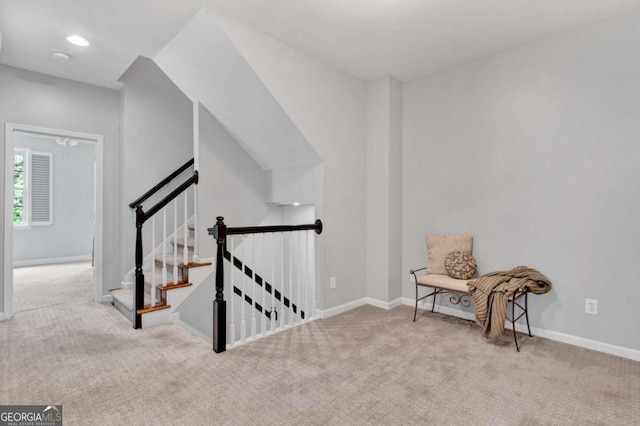 sitting room with carpet floors and baseboards