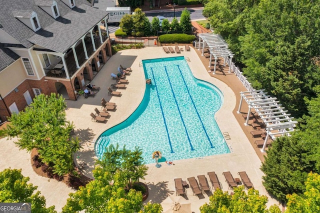community pool featuring a patio