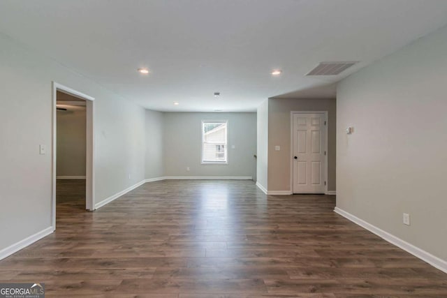 233 Clayton St, Fairburn, GA 30213 - unfurnished room with dark wood-style flooring and recessed lighting