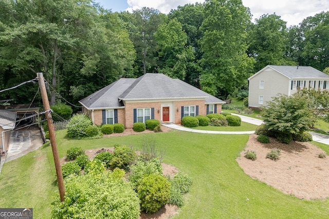 402 Johannah Pl SW, Lilburn, GA 30047 - view of front of home with a front lawn and brick siding