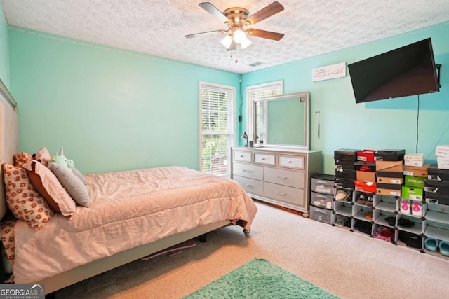 4549 Clarks Creek Ter, Ellenwood, GA 30294 - carpeted bedroom featuring ceiling fan and a textured ceiling