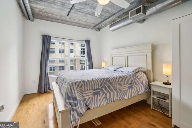 800 Peachtree St NE Unit 2304, Atlanta, GA 30308 - bedroom with wood finished floors and a ceiling fan