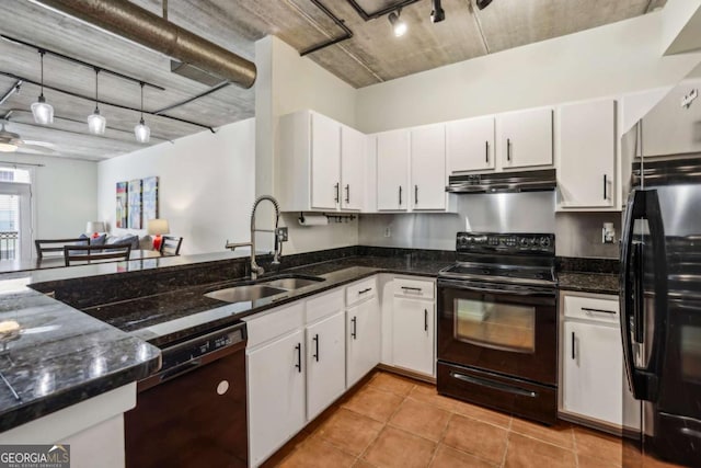 800 Peachtree St NE Unit 2304, Atlanta, GA 30308 - kitchen featuring black appliances, under cabinet range hood, white cabinetry, and dark stone counters