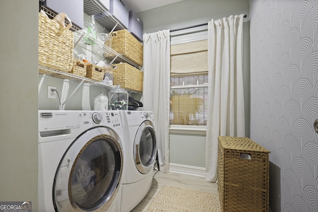 1199 Kenway Cir SE, Smyrna, GA 30082 - washroom featuring washing machine and dryer, light wood-style floors, and baseboards