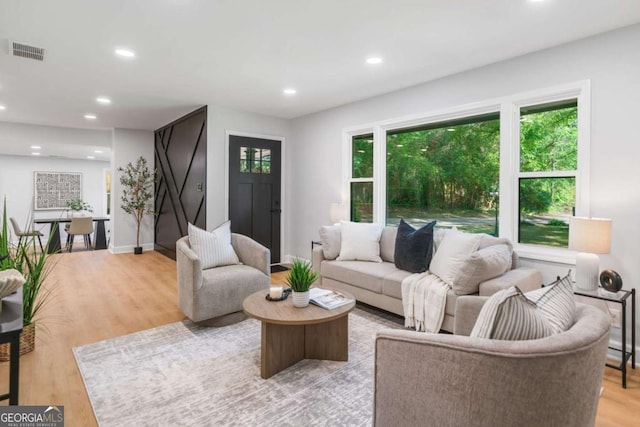 2781 Long Way, Decatur, GA 30032 - living area featuring light wood-type flooring, recessed lighting, and baseboards