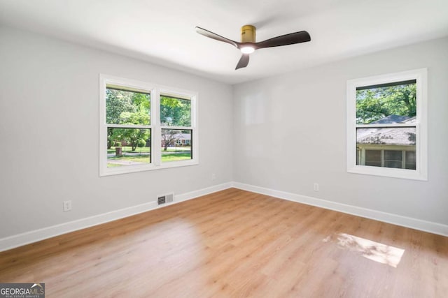 2781 Long Way, Decatur, GA 30032 - empty room featuring healthy amount of natural light, baseboards, and light wood finished floors