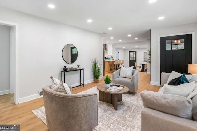 2781 Long Way, Decatur, GA 30032 - living area with recessed lighting, light wood-type flooring, and baseboards