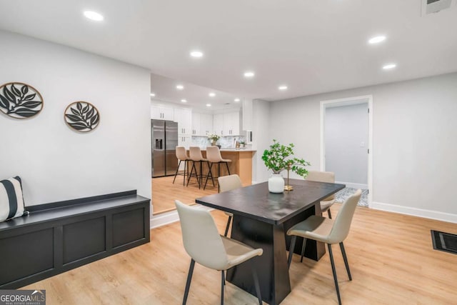 2781 Long Way, Decatur, GA 30032 - dining area with light wood-type flooring, recessed lighting, and baseboards