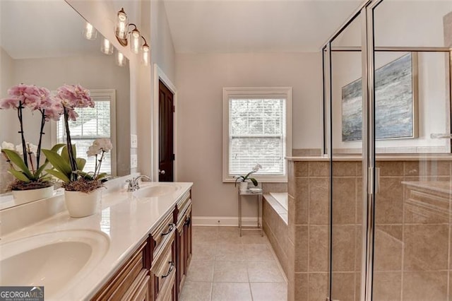 7435 Jamestown Dr, Alpharetta, GA 30005 - bathroom with double vanity, a bath, tile patterned flooring, and tiled shower