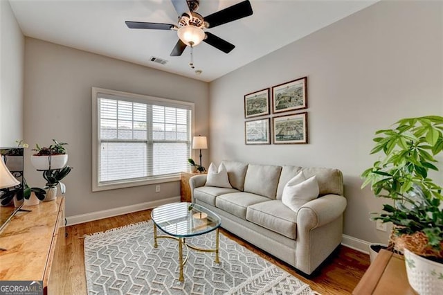 7435 Jamestown Dr, Alpharetta, GA 30005 - living area with a ceiling fan and wood finished floors