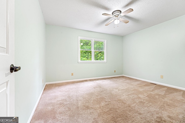 251 Cherokee Dr, Fair Play, SC 29693 - carpeted spare room featuring a ceiling fan, a textured ceiling, and baseboards