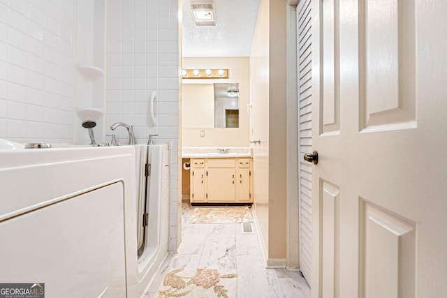 251 Cherokee Dr, Fair Play, SC 29693 - full bathroom featuring marble look tile flooring, a walk in shower, and vanity