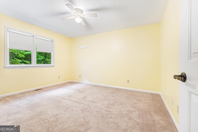 251 Cherokee Dr, Fair Play, SC 29693 - unfurnished room featuring carpet flooring, a ceiling fan, baseboards, and a textured ceiling