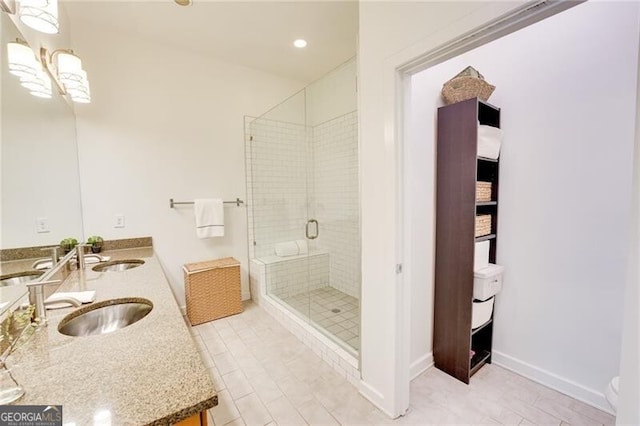 1430 Dresden Dr NE Unit 225, Atlanta, GA 30319 - full bath featuring a stall shower, double vanity, baseboards, and recessed lighting