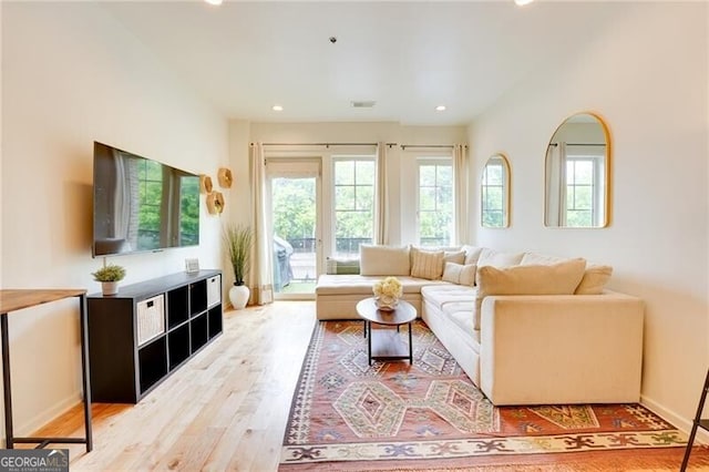 1430 Dresden Dr NE Unit 225, Atlanta, GA 30319 - living room featuring wood finished floors, recessed lighting, and baseboards
