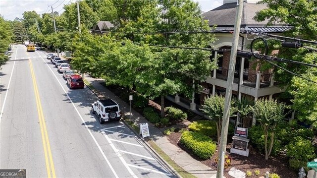 1430 Dresden Dr NE Unit 225, Atlanta, GA 30319 - view of asphalt road with sidewalks and curbs