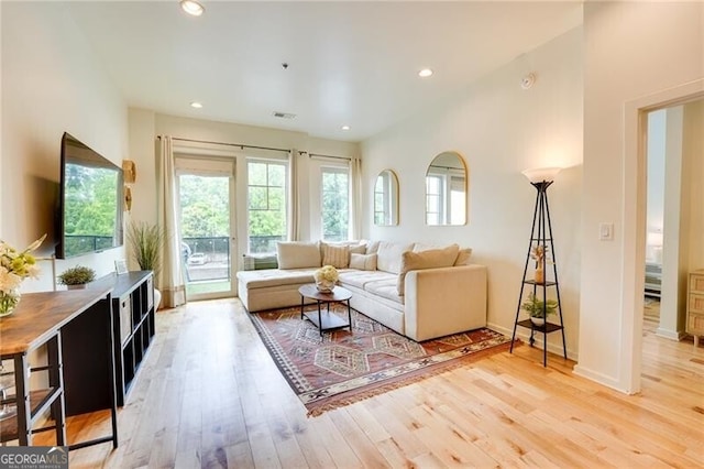 1430 Dresden Dr NE Unit 225, Atlanta, GA 30319 - living area with wood finished floors, recessed lighting, and baseboards