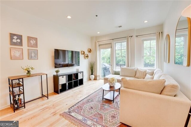 1430 Dresden Dr NE Unit 225, Atlanta, GA 30319 - living area featuring wood finished floors and recessed lighting