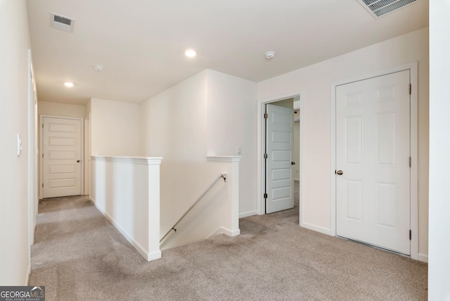 673 Graham Campbell Ln, Statham, GA 30666 - hallway with an upstairs landing, carpet floors, and recessed lighting