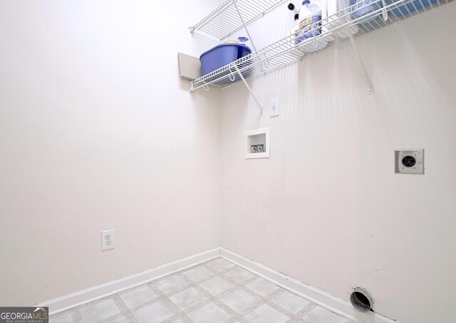 44 Arbor Way, Newnan, GA 30265 - clothes washing area with electric dryer hookup, washer hookup, baseboards, and light floors