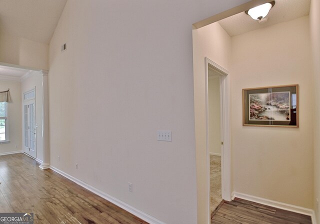 44 Arbor Way, Newnan, GA 30265 - interior space featuring wood finished floors, baseboards, and vaulted ceiling