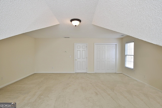 44 Arbor Way, Newnan, GA 30265 - bonus room featuring a textured ceiling, light colored carpet, and baseboards