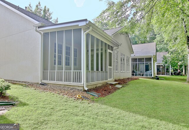 44 Arbor Way, Newnan, GA 30265 - view of side of home with a sunroom and a yard